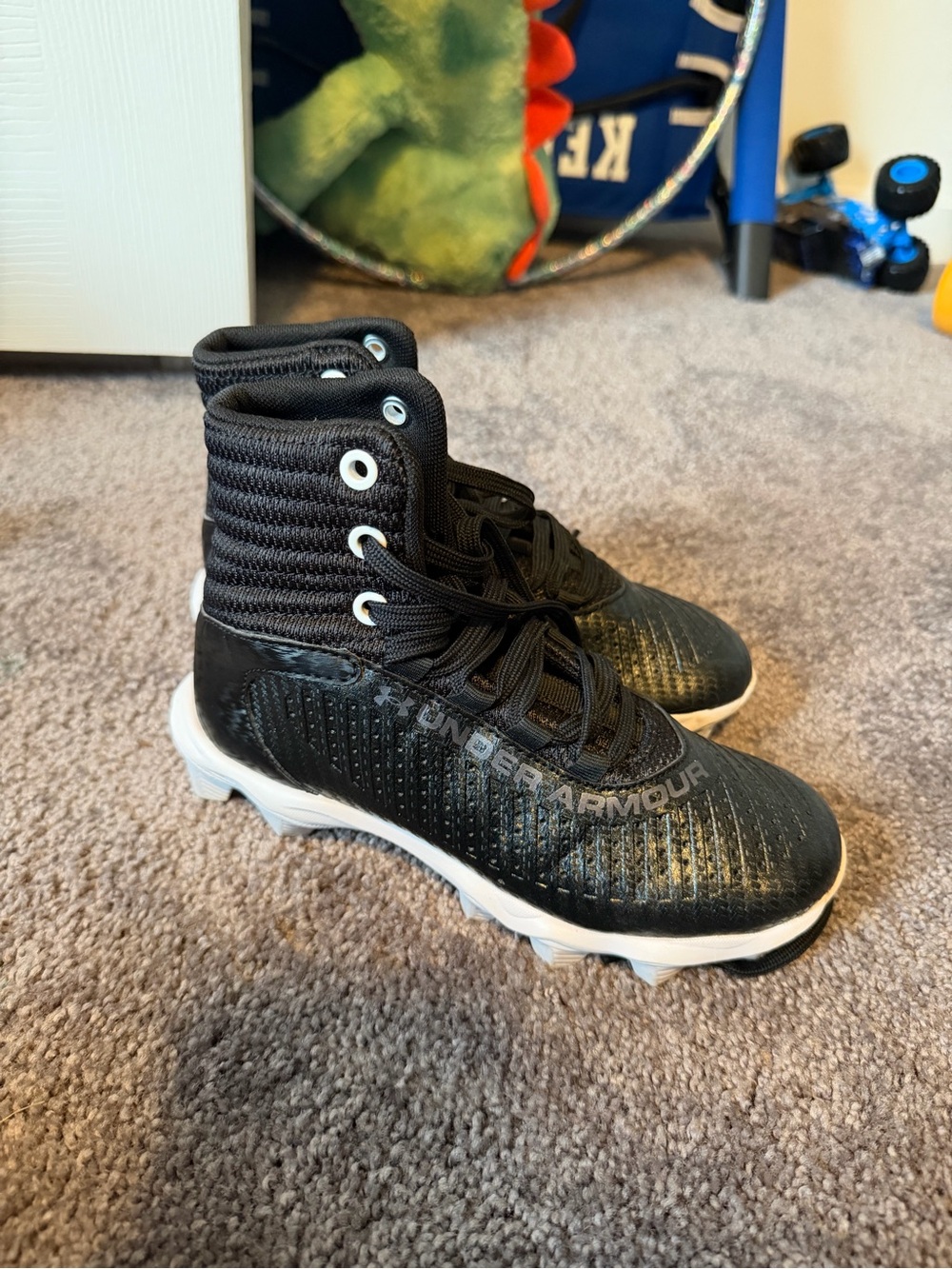 Under Armour Kids Black and White High-Top Cleats